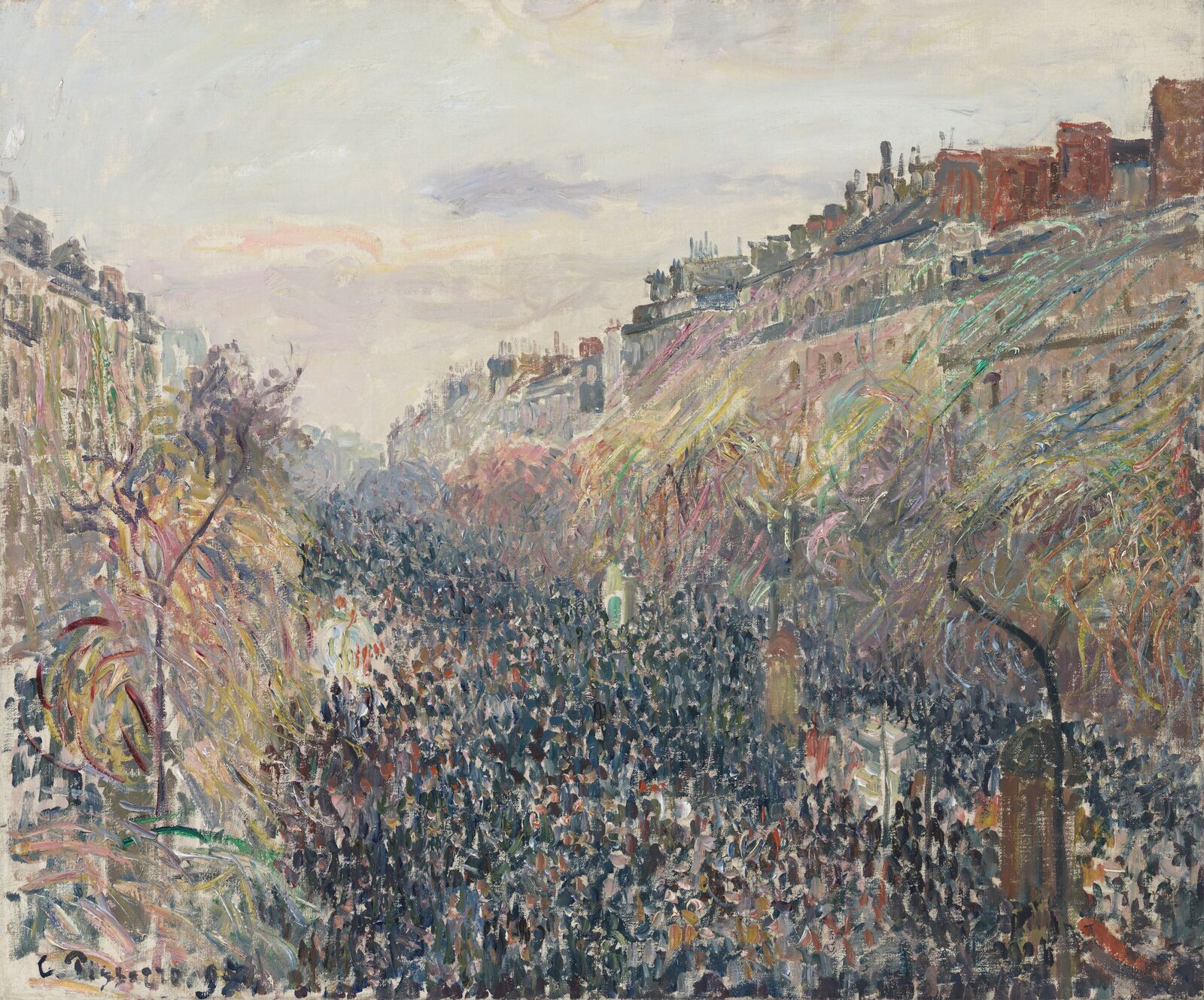 On Mardi Gras, the boulevard is black with crowds of people.