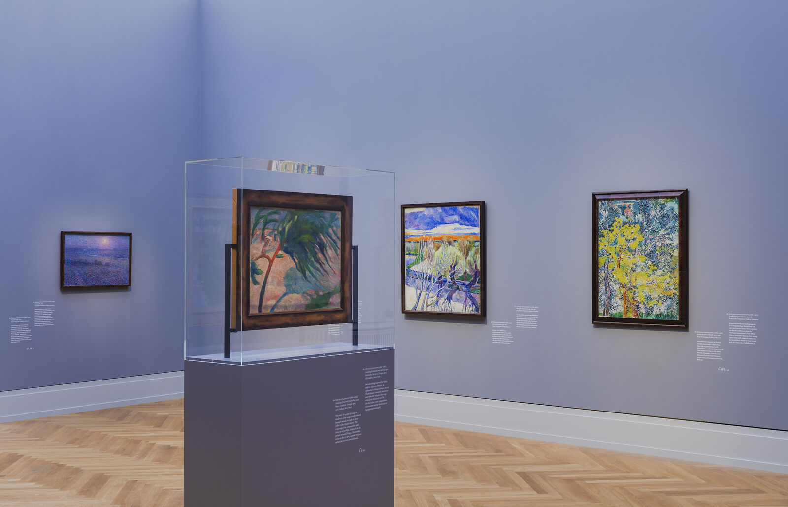 Shown works: Mikhail Larionov: Landscape (Girl with Umbrella), 1910, ABA Gallery, New York; Natalia Goncharova: Riverbank: Sunset, 1907–08; Landscape (Pointillated), 1907–08, State Tretyakov Gallery, Moscow
